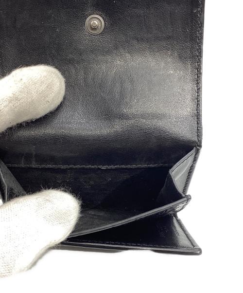 Saint Laurent Paris（サンローランパリ）Saint Laurent Paris (サンローランパリ) エンボスクロコダイル タイニーウォレット　CFP459996 ブラックの古着・服飾アイテム