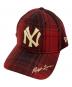 New Era（ニューエラ）の古着「キャップ」｜レッド