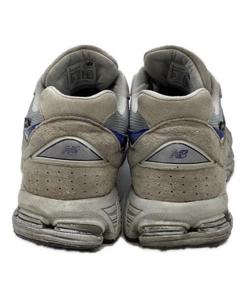 NEW BALANCE（ニューバランス）NEW BALANCE (ニューバランス) M2002RXB ローカットスニーカー グレー×ブルー サイズ:27の古着・服飾アイテム
