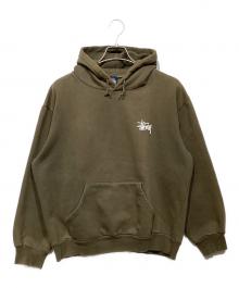 stussy（ステューシー）の古着「90ｓ WORLD TOURプルオーバーパーカー」｜オリーブ