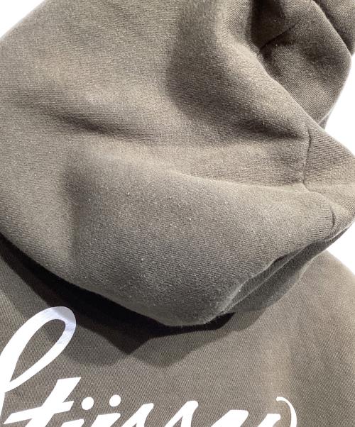 stussy（ステューシー）stussy (ステューシー) 90ｓ WORLD TOURプルオーバーパーカー オリーブ サイズ:Lの古着・服飾アイテム