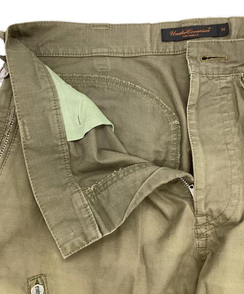 UNDERCOVERISM（アンダーカバーイズム）UNDERCOVERISM (アンダーカバーイズム) ミリタリージップカーゴパンツ オリーブ サイズ:Mの古着・服飾アイテム