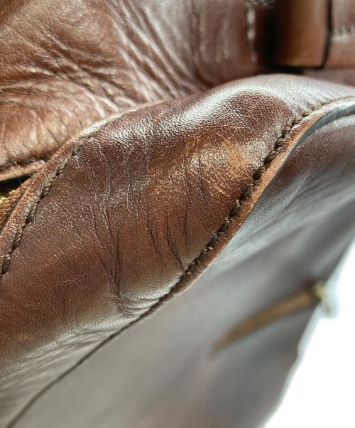 MOTHERHOUSE（マザーハウス）MOTHERHOUSE (マザーハウス) アンティーク スクエア バックパック ブラウンの古着・服飾アイテム