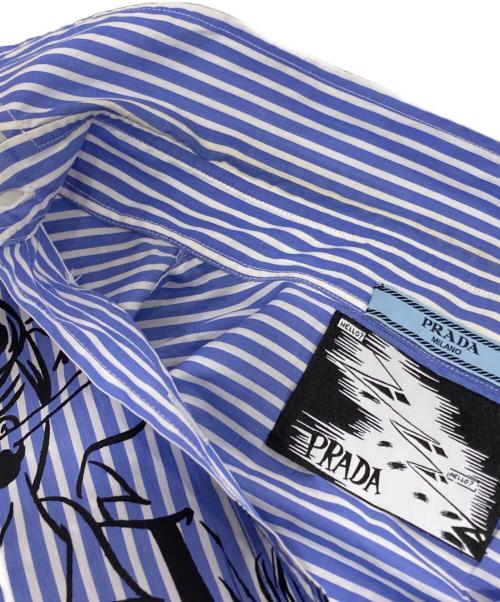 PRADA（プラダ）PRADA (プラダ) コミックプリントストライプシャツ ブルー サイズ:42の古着・服飾アイテム