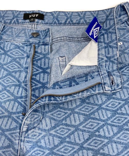 HUF（ハフ）HUF (ハフ) UMBRO (アンブロ) 総柄デニムパンツ インディゴ サイズ:32の古着・服飾アイテム