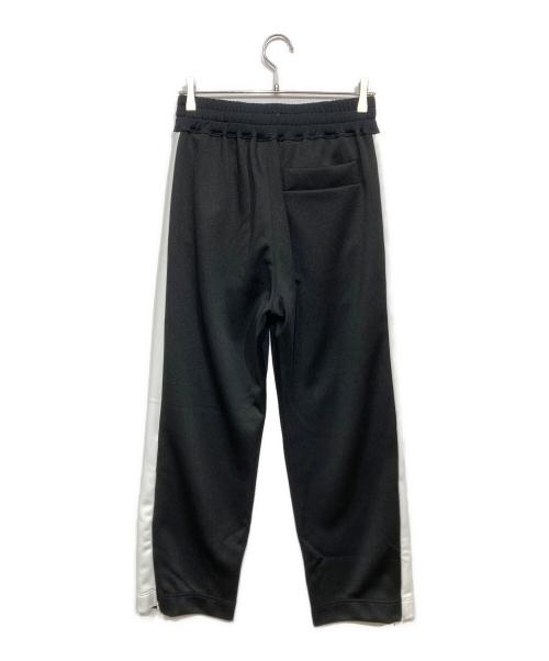 Vivienne Westwood man（ヴィヴィアン ウェストウッド マン）Vivienne Westwood man (ヴィヴィアン ウェストウッド マン) トラックパンツ ブラック×ホワイト サイズ:44の古着・服飾アイテム
