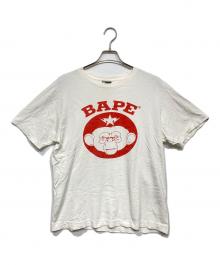 A BATHING APE（アベイシングエイプ）の古着「プリントTシャツ」｜ホワイト