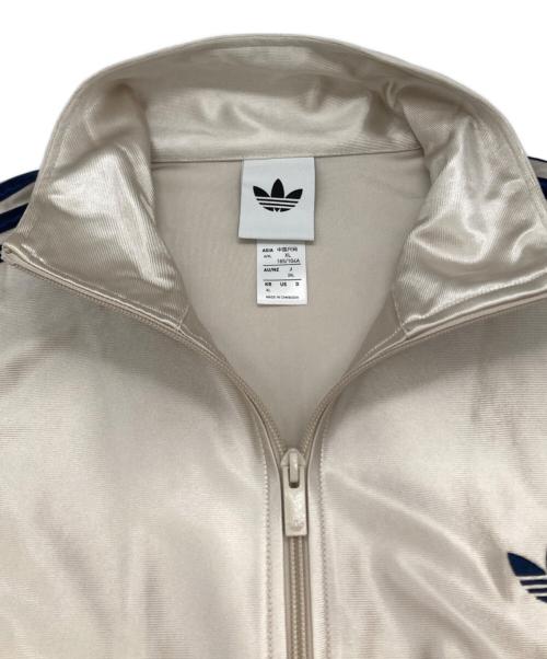 adidas（アディダス）adidas (アディダス) ファイヤーバード トラックジャケット　KD9372 ベージュ×ネイビー サイズ:J 2XLの古着・服飾アイテム