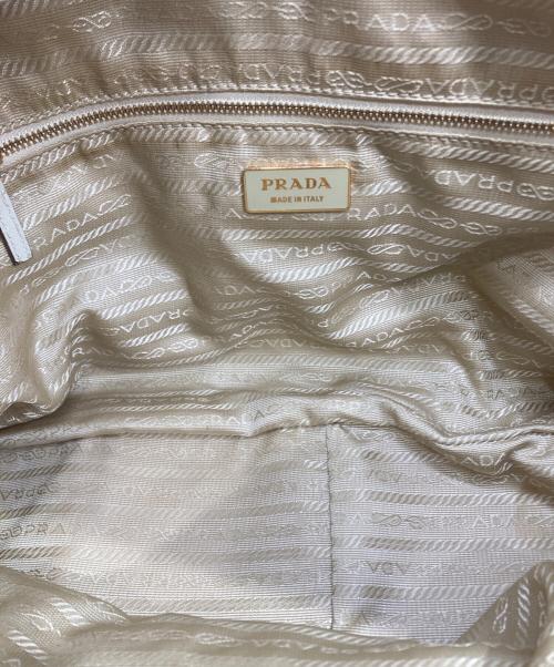 PRADA（プラダ）PRADA (プラダ) パンチングレザーボストンバッグ ベージュの古着・服飾アイテム