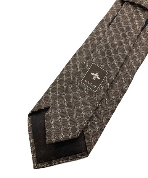 GUCCI（グッチ）GUCCI (グッチ) インターロッキング総柄ネクタイ ブラウン サイズ:148×8㎝の古着・服飾アイテム