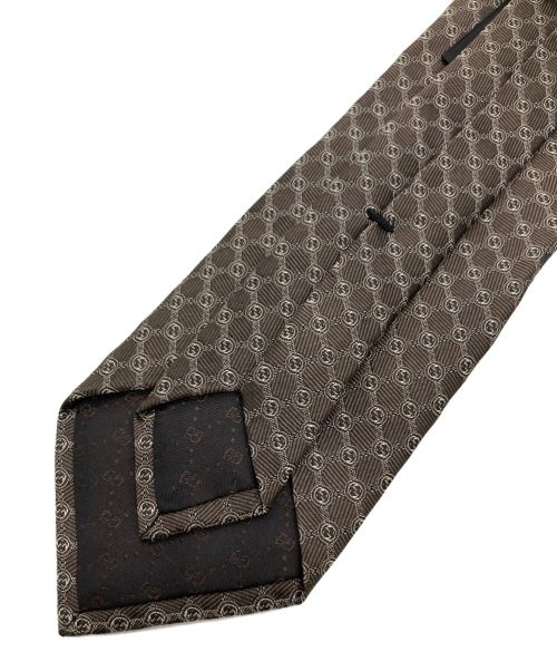 GUCCI（グッチ）GUCCI (グッチ) インターロッキング総柄ネクタイ ブラウン サイズ:148×8㎝の古着・服飾アイテム