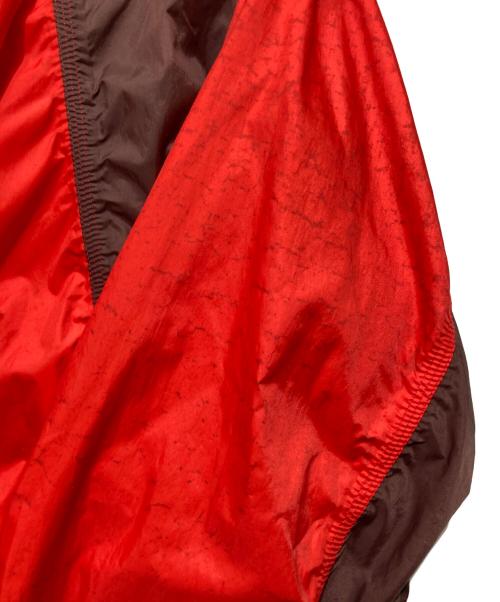 ISSEY MIYAKE（イッセイミヤケ）ISSEY MIYAKE (イッセイミヤケ) ISSEY MIYAKE ナイロンパラシュートコート オーバーサイズ レッド×ブラウン サイズ:2の古着・服飾アイテム