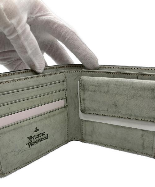 Vivienne Westwood（ヴィヴィアンウエストウッド）Vivienne Westwood (ヴィヴィアンウエストウッド) ユーズド加工2つ折り財布 グリーンの古着・服飾アイテム