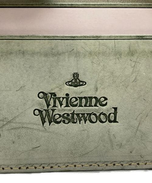 Vivienne Westwood（ヴィヴィアンウエストウッド）Vivienne Westwood (ヴィヴィアンウエストウッド) ユーズド加工2つ折り財布 グリーンの古着・服飾アイテム