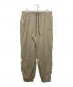 New Eraニューエラ）の古着「オーバーサイズド パイピング トラックパンツ」｜ブラウン