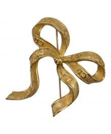 Christian Dior（クリスチャン ディオール）の古着「リボンブローチ」｜ゴールド