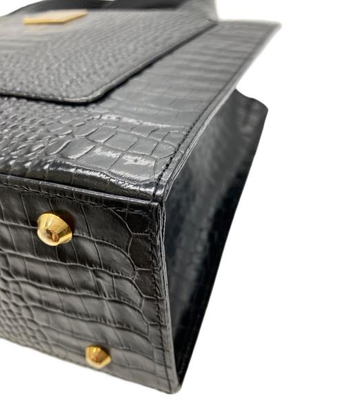 Yves Saint Laurent（イヴサンローラン）Yves Saint Laurent (イヴサンローラン) 型押しレザーハンドバッグ ブラックの古着・服飾アイテム