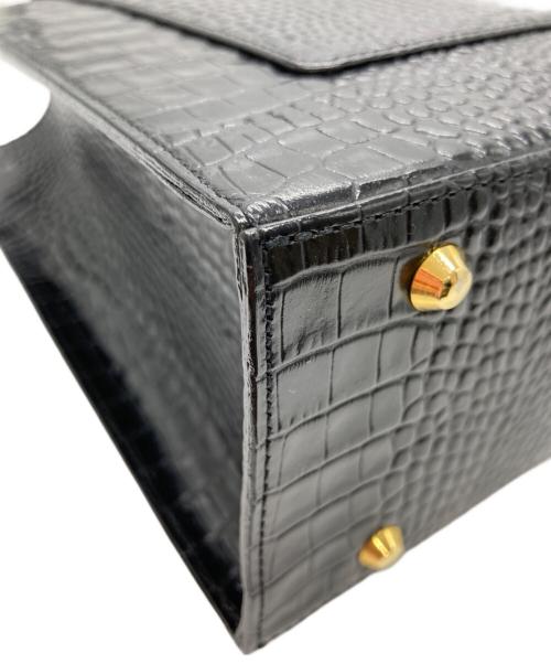 Yves Saint Laurent（イヴサンローラン）Yves Saint Laurent (イヴサンローラン) 型押しレザーハンドバッグ ブラックの古着・服飾アイテム