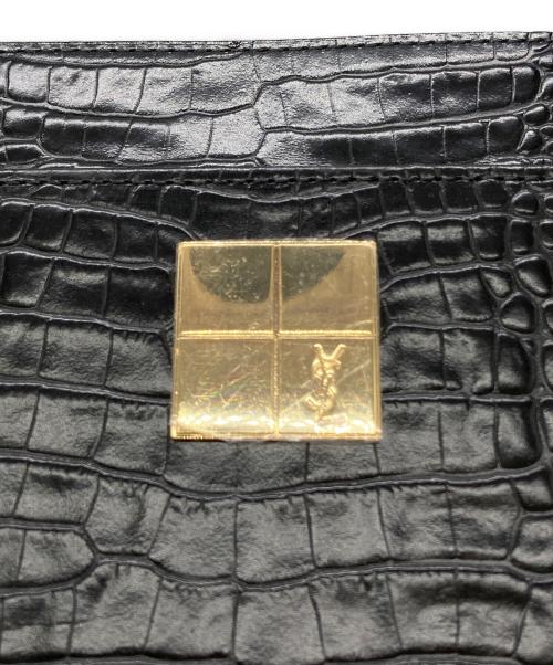 Yves Saint Laurent（イヴサンローラン）Yves Saint Laurent (イヴサンローラン) 型押しレザーハンドバッグ ブラックの古着・服飾アイテム