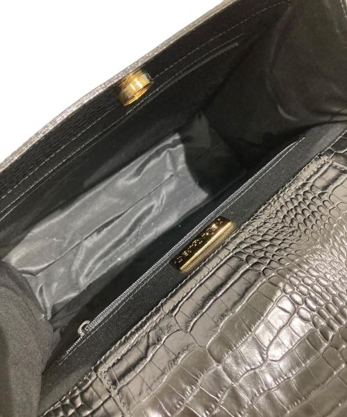 Yves Saint Laurent（イヴサンローラン）Yves Saint Laurent (イヴサンローラン) 型押しレザーハンドバッグ ブラックの古着・服飾アイテム