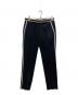 GUCCI（グッチ）の古着「パイピングスラックスパンツ」｜ブラック