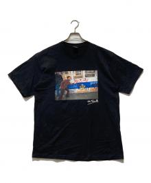 stussy（ステューシー）の古着「John NaarTシャツ」｜ブラック