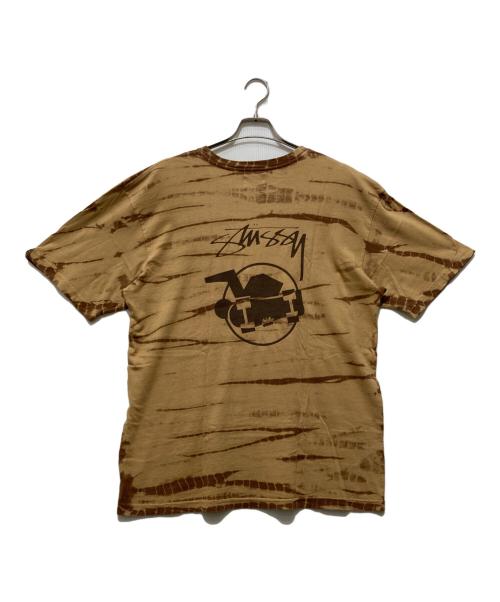 stussy（ステューシー）stussy (ステューシー) スケートマンTシャツ ベージュ サイズ:Lの古着・服飾アイテム