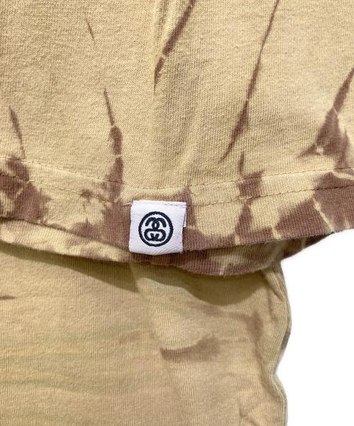 stussy（ステューシー）stussy (ステューシー) スケートマンTシャツ ベージュ サイズ:Lの古着・服飾アイテム