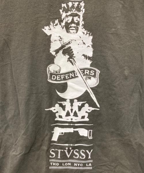 stussy（ステューシー）stussy (ステューシー) DEFENDERS Tee カーキ サイズ:XLの古着・服飾アイテム