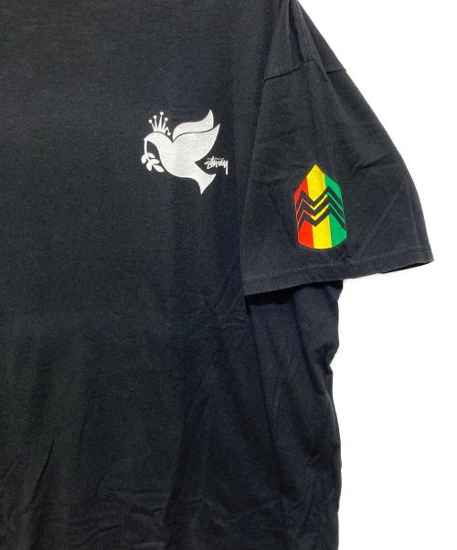 stussy（ステューシー）stussy (ステューシー) INCREASE THE PEACE TEE インクリーズザピース ラスタ バード Tシャツ ブラック サイズ:XLの古着・服飾アイテム