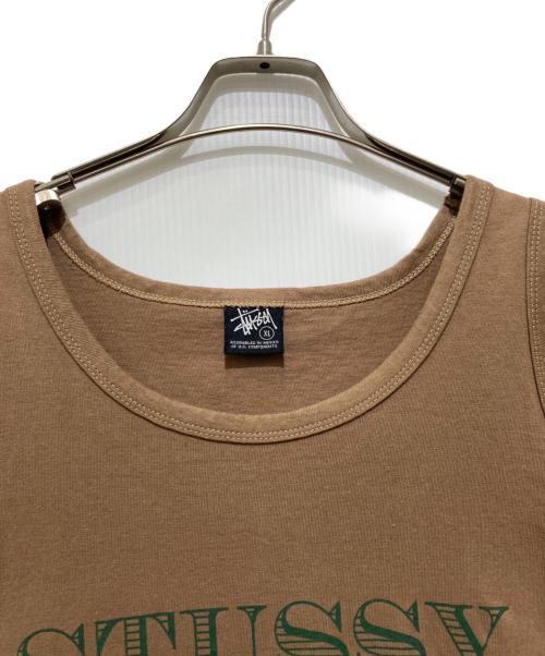 stussy（ステューシー）stussy (ステューシー) タンクトップ / プリントノースリーブカットソー ブラウン サイズ:XLの古着・服飾アイテム