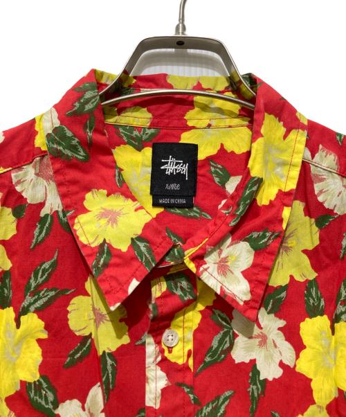 stussy（ステューシー）stussy (ステューシー) 総柄シャツ / ハイビスカス柄 半袖シャツ レッド×イエロー サイズ:XLの古着・服飾アイテム