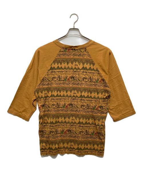 stussy（ステューシー）stussy (ステューシー) ラスタ総柄 ラグラン カットソー ブラウン サイズ:XLの古着・服飾アイテム