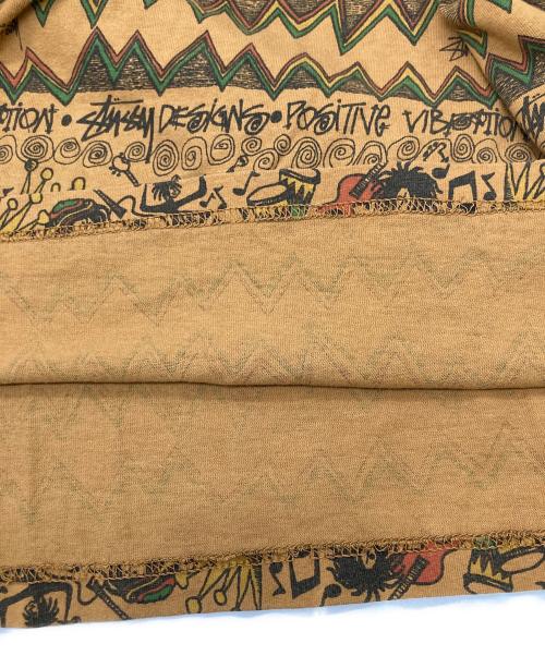 stussy（ステューシー）stussy (ステューシー) ラスタ総柄 ラグラン カットソー ブラウン サイズ:XLの古着・服飾アイテム