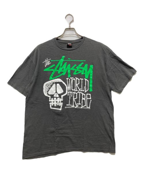 stussy（ステューシー）stussy (ステューシー) World Tribe スカルTシャツ / プリントTシャツ グレー サイズ:XLの古着・服飾アイテム