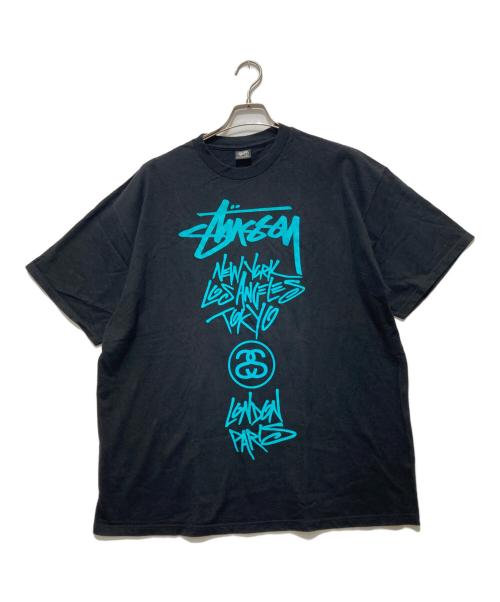 stussy（ステューシー）stussy (ステューシー) ワールドツアーTシャツ / プリントTシャツ ブラック サイズ:XLの古着・服飾アイテム