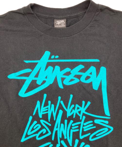 stussy（ステューシー）stussy (ステューシー) ワールドツアーTシャツ / プリントTシャツ ブラック サイズ:XLの古着・服飾アイテム