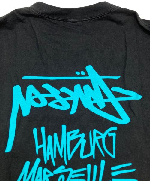 stussy（ステューシー）stussy (ステューシー) ワールドツアーTシャツ / プリントTシャツ ブラック サイズ:XLの古着・服飾アイテム
