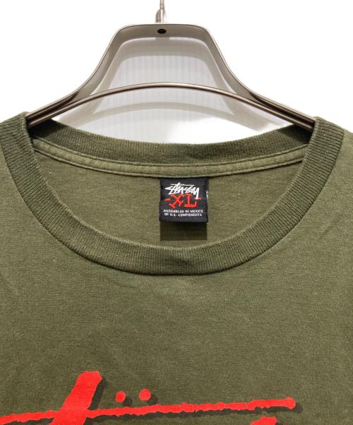 stussy（ステューシー）stussy (ステューシー) スカルTシャツ / プリントTシャツ カーキ サイズ:XLの古着・服飾アイテム