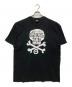stussy（ステューシー）の古着「WORLD WIDE OLD SKOOL TRIBE Tee / ワールドワイドオールドスクールトライブ スカル Tシャツ」｜ブラック