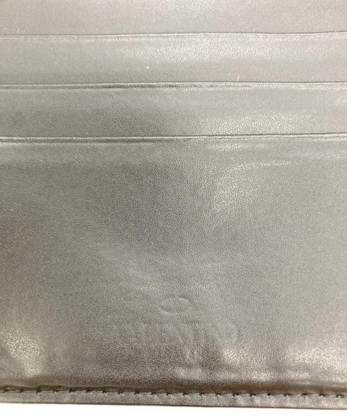 VALENTINO GARAVANI（ヴァレンティノ・ガラヴァーニ）VALENTINO GARAVANI (ヴァレンティノ・ガラヴァーニ) ネックストラップ付2つ折り財布 ブラックの古着・服飾アイテム