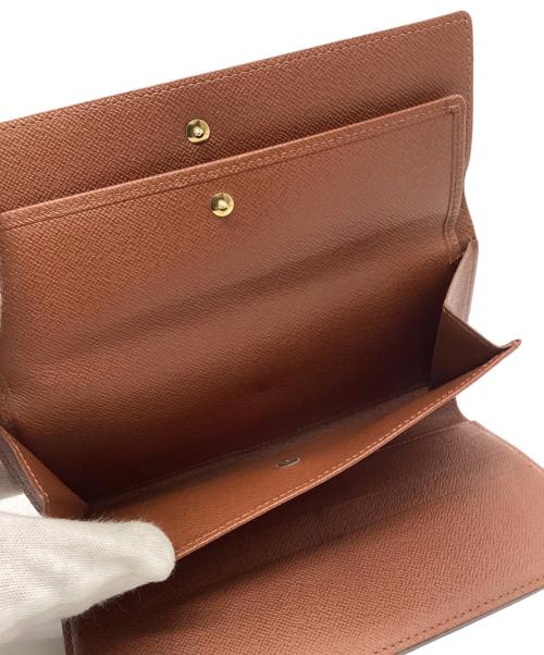 LOUIS VUITTON（ルイ ヴィトン）LOUIS VUITTON (ルイ ヴィトン) モノグラム ポルト トレゾールインターナショナル 長財布 3つ折り ブラウンの古着・服飾アイテム