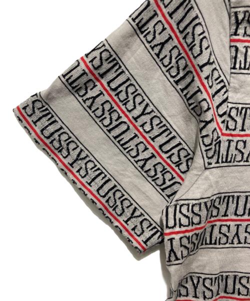 stussy（ステューシー）stussy (ステューシー) MTV (エムティービー) ジャガードロゴテープTシャツ グレー サイズ:XLの古着・服飾アイテム