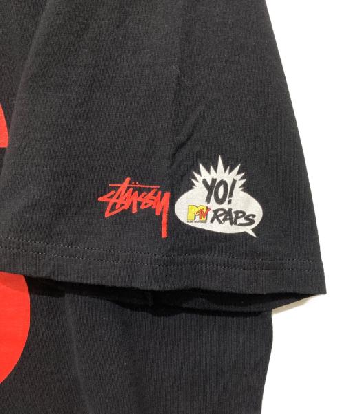 stussy（ステューシー）stussy (ステューシー) MTV (エムティービー) Yo!Raps MC LYTE Tシャツ / コラボTシャツ / プリントTシャツ ブラック サイズ:XLの古着・服飾アイテム