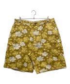 stussyステューシー）の古着「フラワーパターンハーフパンツ」｜イエロー