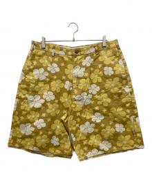 stussy（ステューシー）の古着「フラワーパターンハーフパンツ」｜イエロー
