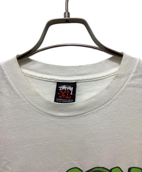 stussy（ステューシー）stussy (ステューシー) レタリングTシャツ / プリントTシャツ / THE WORLD FAMOUS INTERNATIONAL STUSSY TRIBE ホワイト サイズ:XLの古着・服飾アイテム