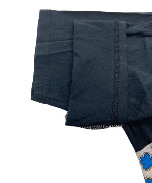 stussy（ステューシー）stussy (ステューシー) ラグランキャラクターTシャツ ブラック サイズ:XLの古着・服飾アイテム