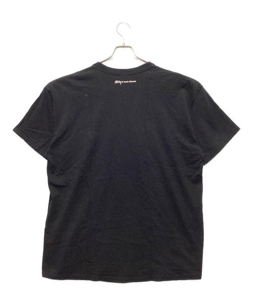 stussy（ステューシー）stussy (ステューシー) Josh Cheuse (ジョシュ チューズ) Big Audio Dynamite Tee / ビッグオーディオダイナマイトTシャツ ブラック サイズ:XLの古着・服飾アイテム