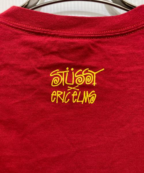 stussy（ステューシー）stussy (ステューシー) ERIC ELMS (エリックエルムズ) BUILT TO DESTORY Tシャツ レッド サイズ:XLの古着・服飾アイテム